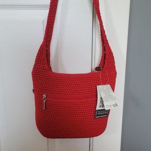 The Sak hand crocheted red crossbody purse